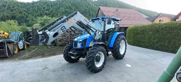 NEW HOLLAND TL90A sa utovarivačem